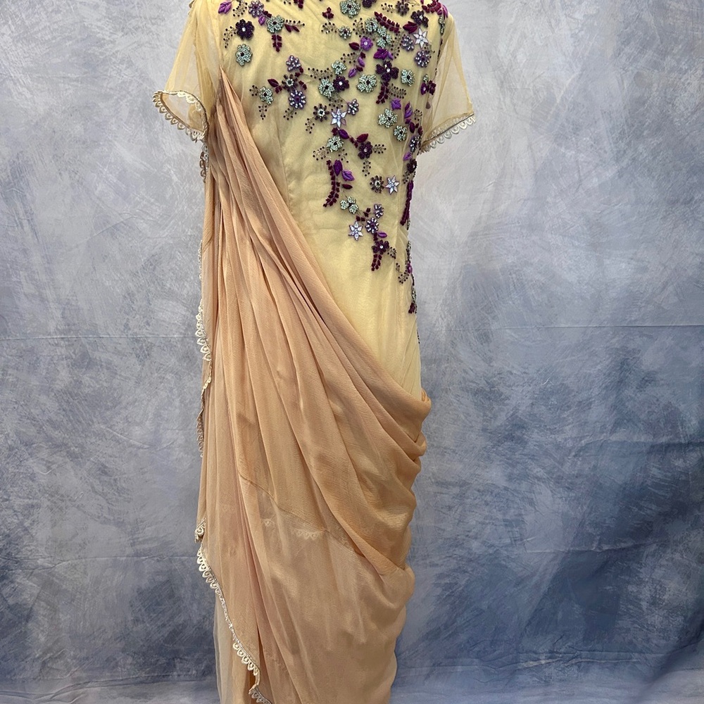 Elegant Cream and Purple Swarovski Embellished sari gown.
